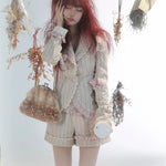 Rose Island Deer collection fawn pattern print faux fur handbag model wearing as handbag and match suits