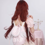 Rose island flying wings backpack wearing on model, back view with studio photo
