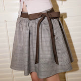 MineBeThyVers Murmure d’Amour plaid A-line midi skirt with ribbon
