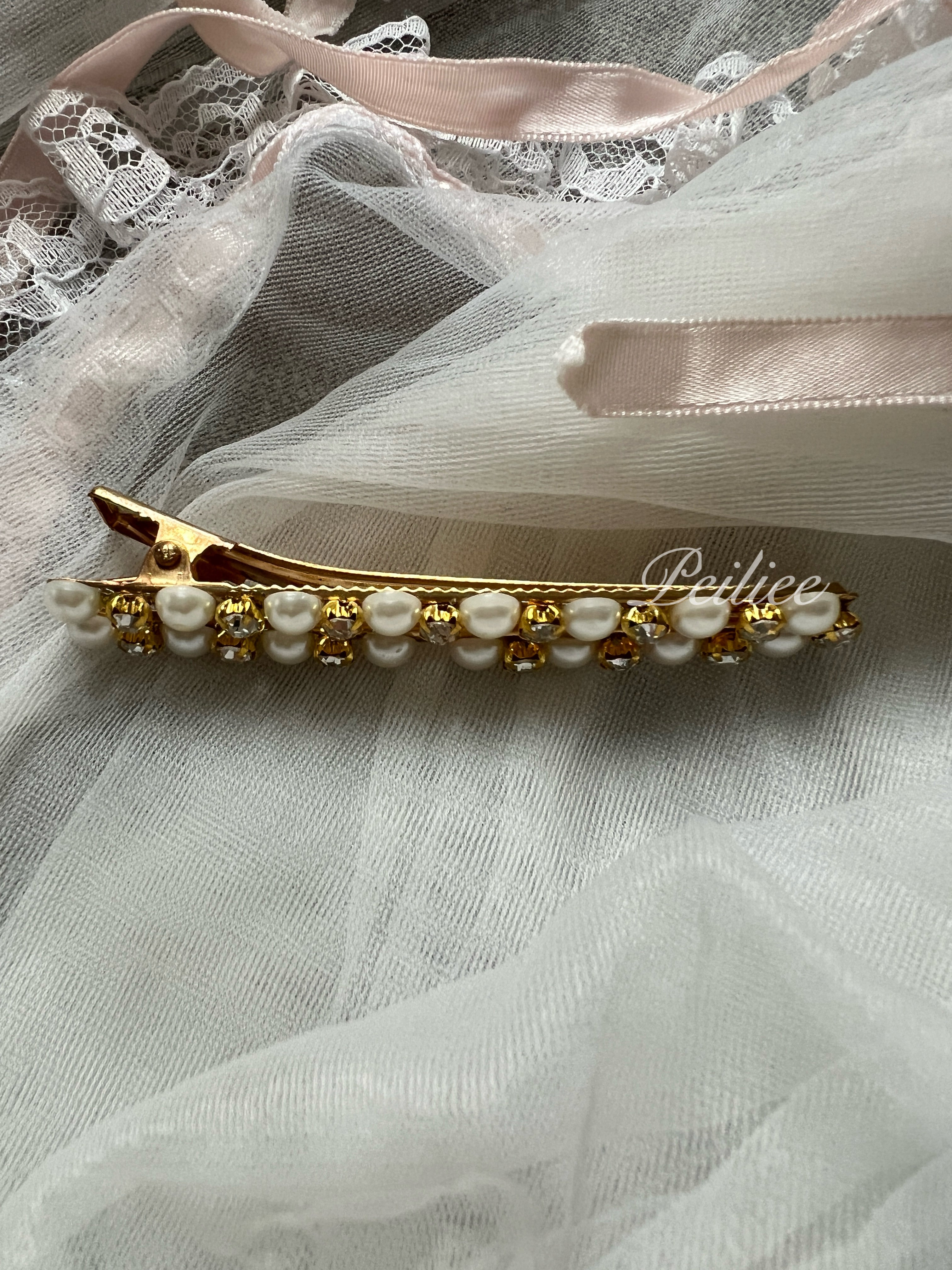 Get trendy with 2 Pieces Princess Pearls Hair Clips -  available at Peiliee Shop. Grab yours for $4.50 today!