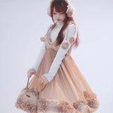 Rose Island Deer collection fawn pattern print faux fur handbag model holding as handbag from side look