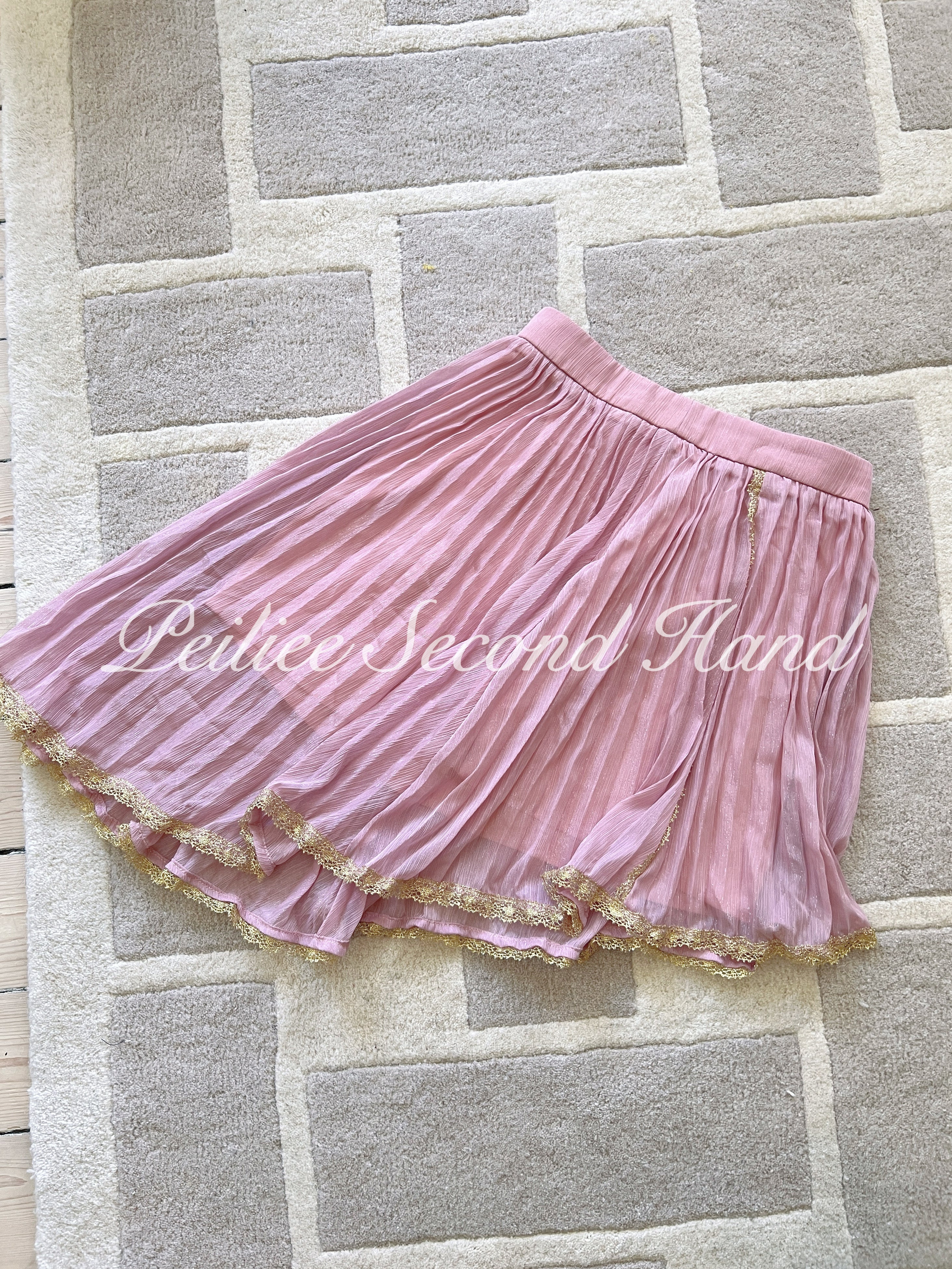 Get trendy with [Sweden Second Hand] Angelic Pink Mini Skirt -  available at Peiliee Shop. Grab yours for $20 today!