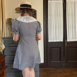 Get trendy with French Doll Gingham Vintage Mini Dress - Dresses available at Peiliee Shop. Grab yours for $34.80 today!