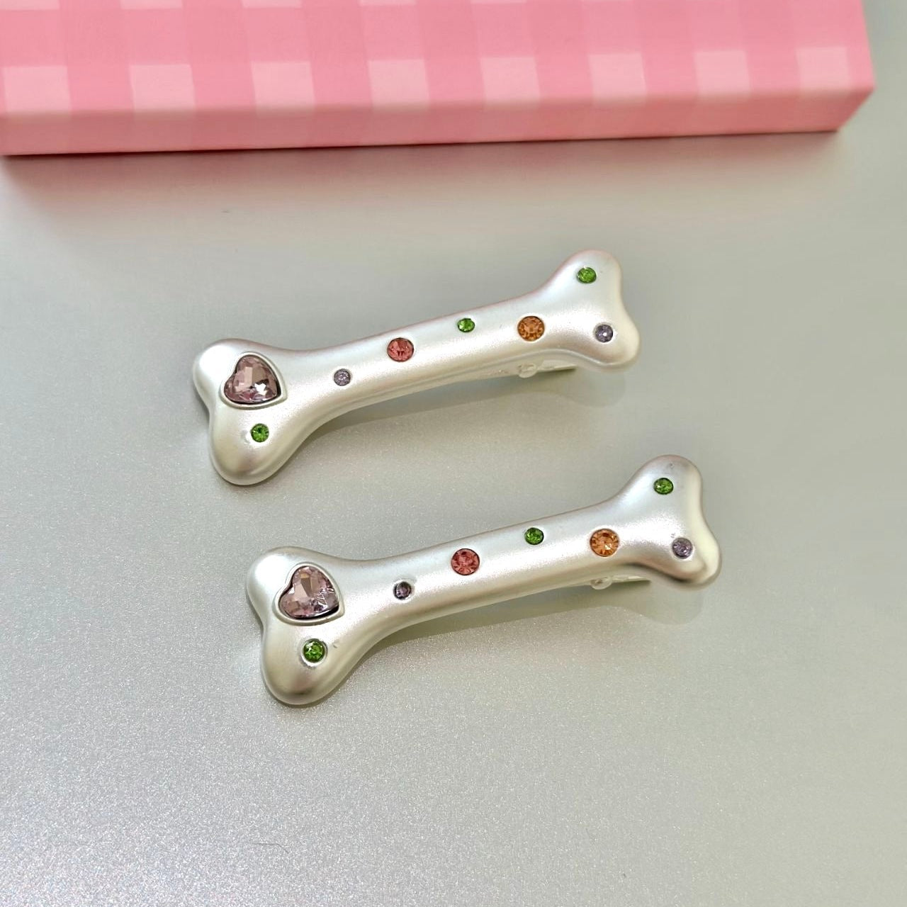 Get trendy with Y2K Lil Puppy Bone Hair Clips -  available at Peiliee Shop. Grab yours for $2.90 today!