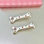 Get trendy with Y2K Lil Puppy Bone Hair Clips -  available at Peiliee Shop. Grab yours for $2.90 today!