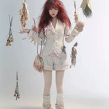 Rose Island Deer collection fawn pattern print faux fur handbag model holding as arm bag with matching suits whole view