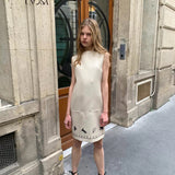 [Pre-order 15% At Checkout] UNOSA Beige Floral Silhouette Sleeveless H-Line Dress