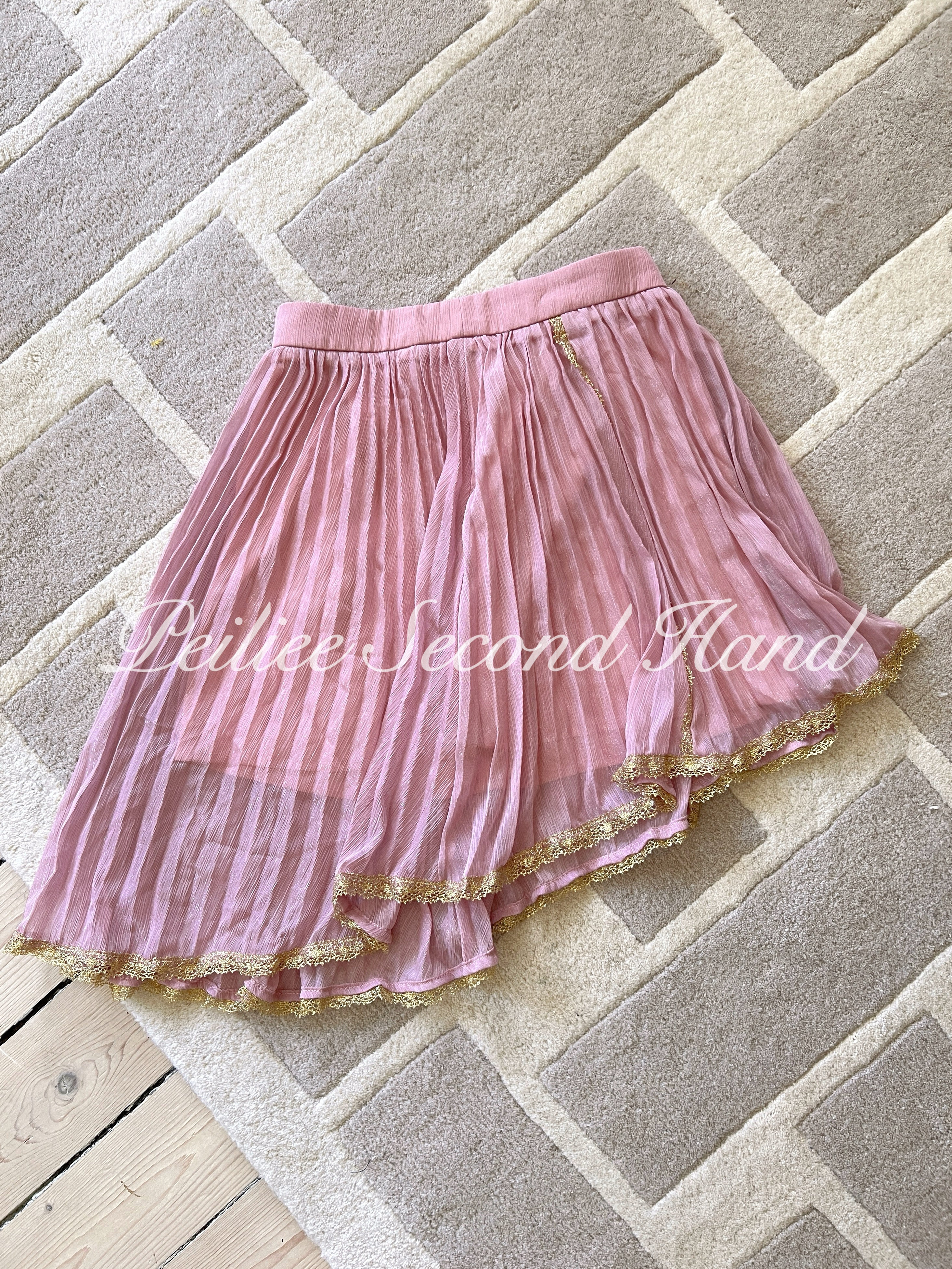 Get trendy with [Sweden Second Hand] Angelic Pink Mini Skirt -  available at Peiliee Shop. Grab yours for $20 today!