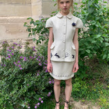 [Pre-order 15% At Checkout] UNOSA Beige Bird & Floral Doll Collar Top and Mini Skirt Set