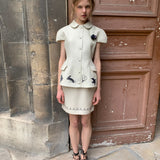 [Pre-order 15% At Checkout] UNOSA Beige Bird & Floral Doll Collar Top and Mini Skirt Set
