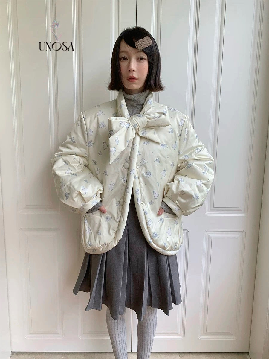 Get trendy with [UNOSA] Bunny and moon padded jacket with ribbon - Coats & Jackets available at Peiliee Shop. Grab yours for $140 today!