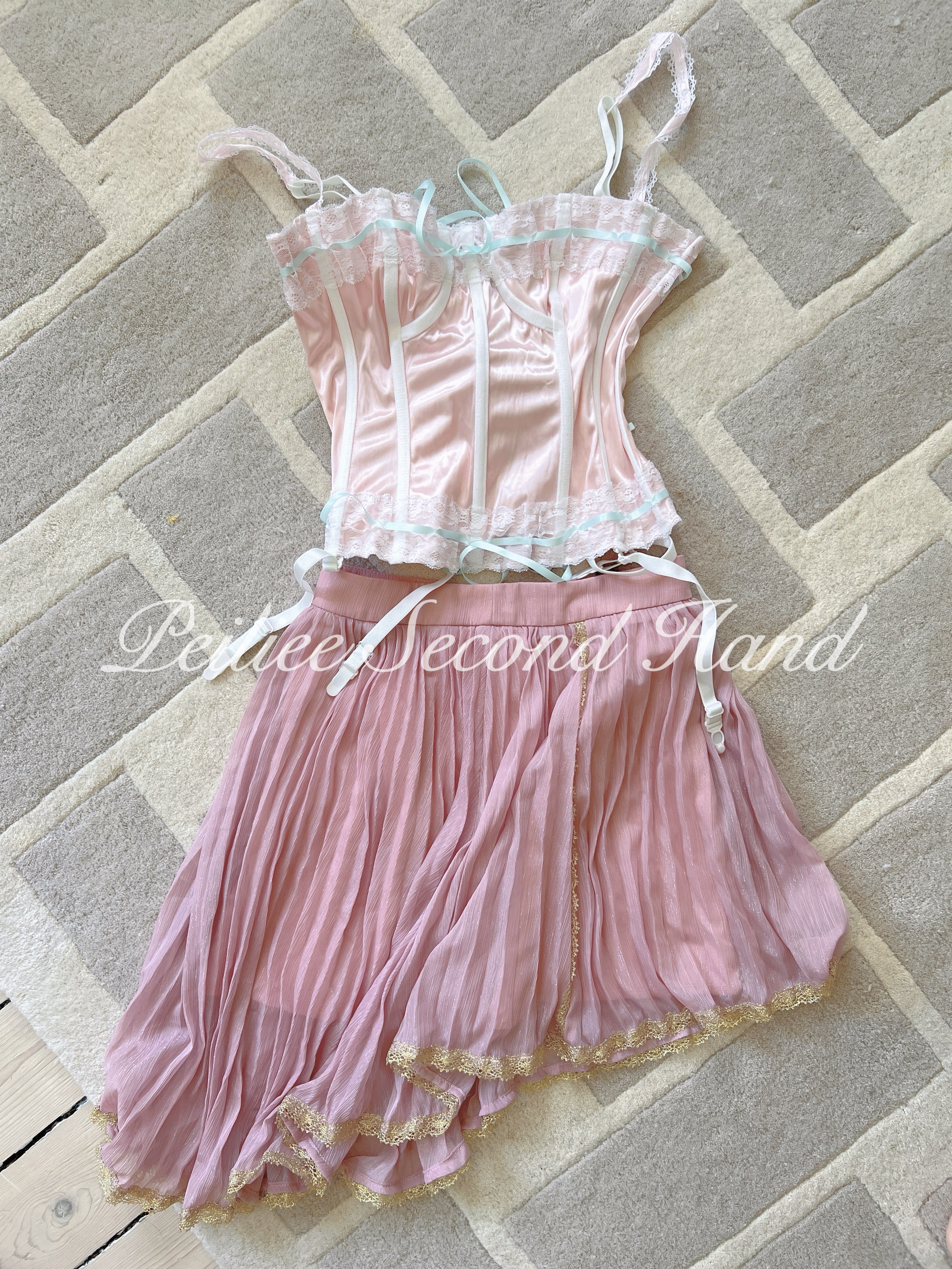 Get trendy with [Sweden Second Hand] Angelic Pink Mini Skirt -  available at Peiliee Shop. Grab yours for $20 today!