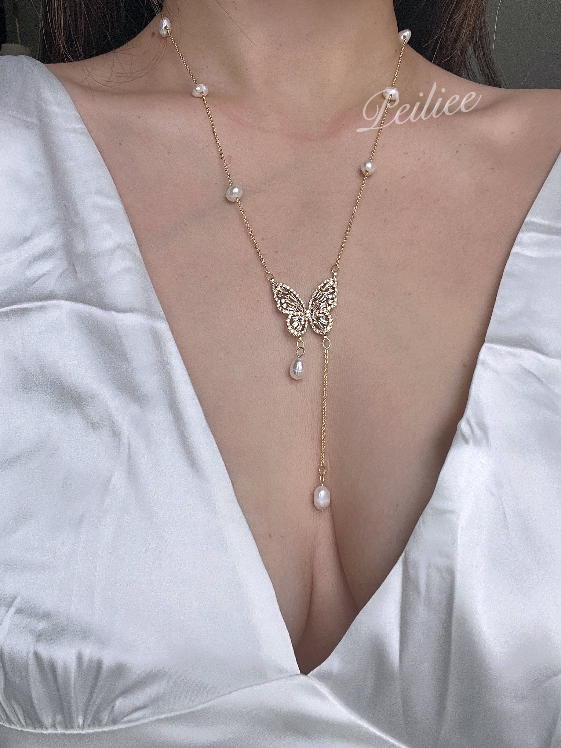 Get trendy with Butterfly dreams lucky charm freshwater pearl necklace -  available at Peiliee Shop. Grab yours for $19.90 today!