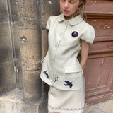 [Pre-order 15% At Checkout] UNOSA Beige Bird & Floral Doll Collar Top and Mini Skirt Set