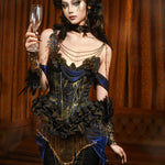 Woman in elaborate costume holding a glass against a brown curtain background