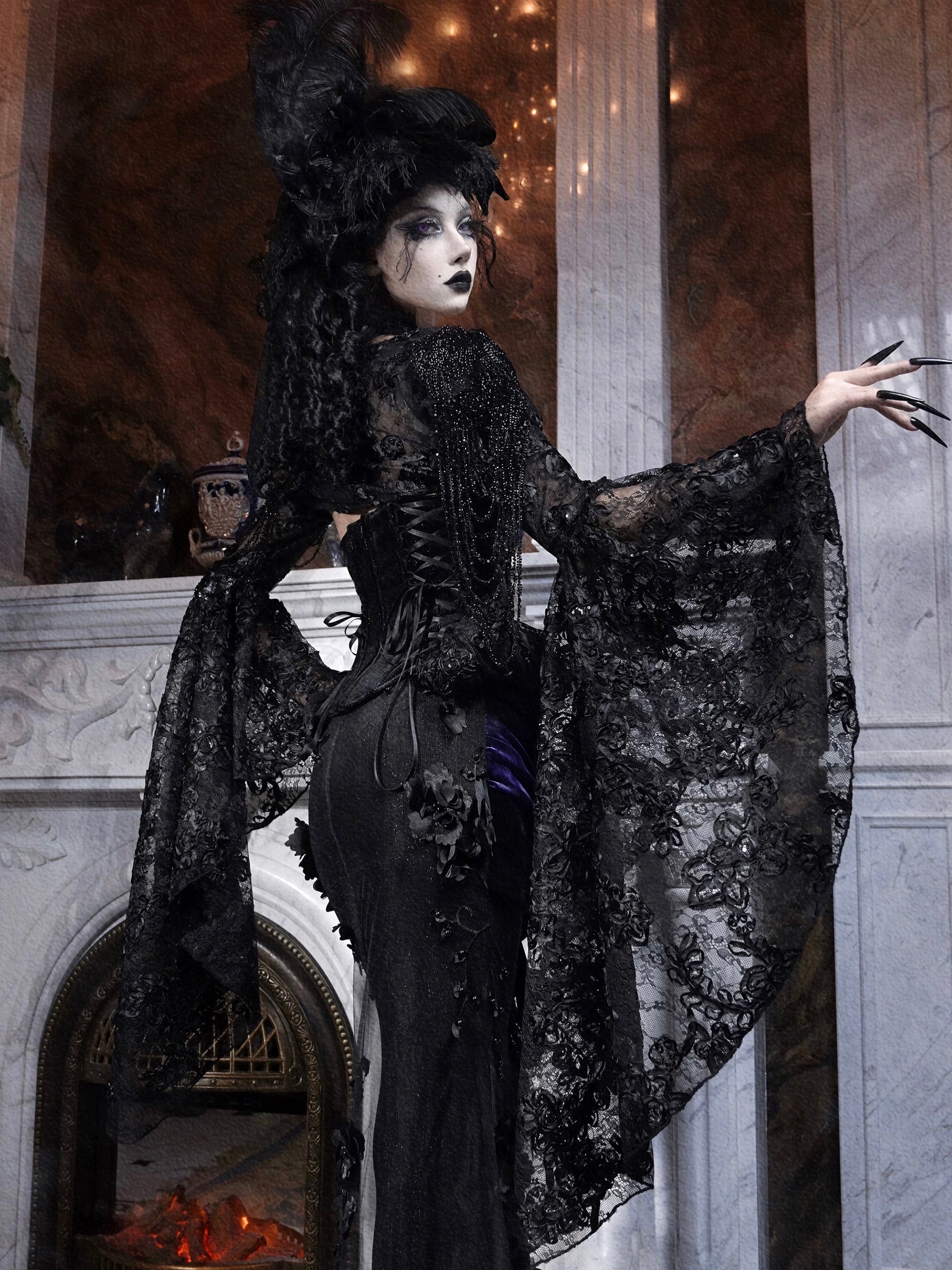 Person in a dark, ornate costume standing in an elegant gothic lace and vintage palace design.
