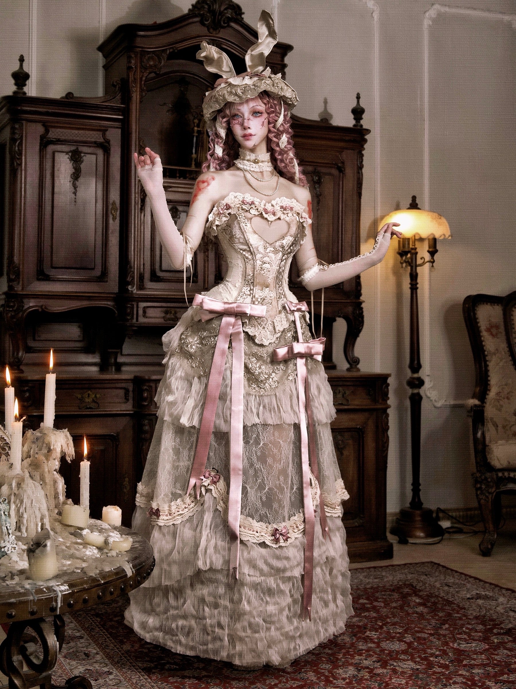 Woman in an elaborate vintage dress with floral details gothic style fashion for halloween custom.