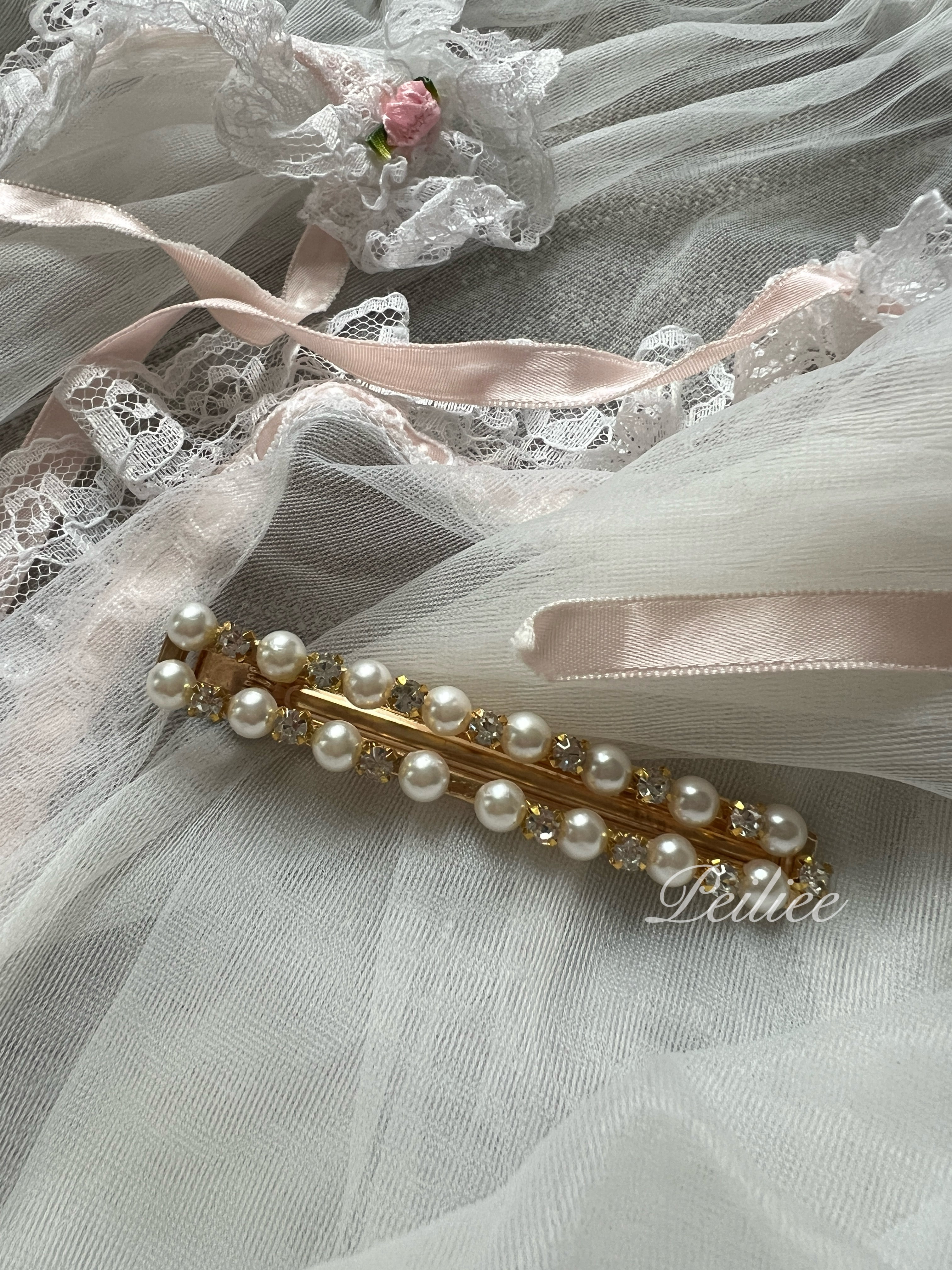 Get trendy with 2 Pieces Princess Pearls Hair Clips -  available at Peiliee Shop. Grab yours for $4.50 today!