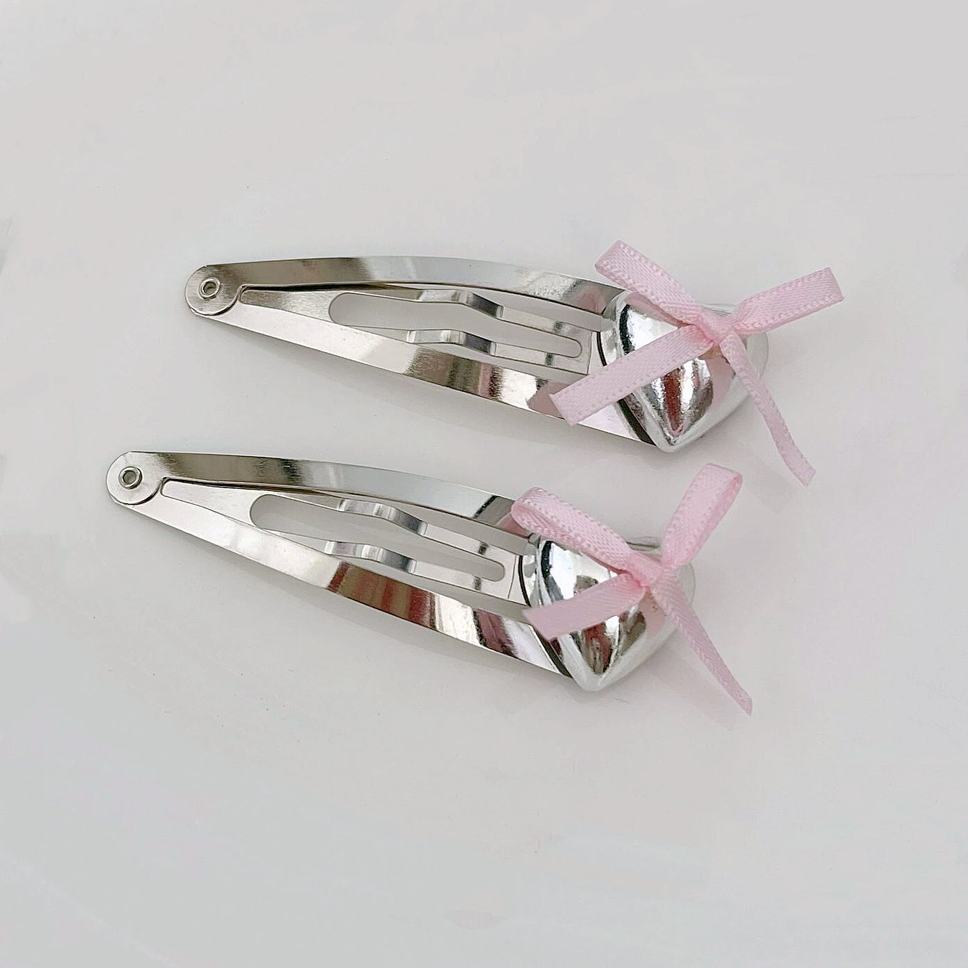 Get trendy with Babydoll silver with soft pink hairpin -  available at Peiliee Shop. Grab yours for $2.50 today!