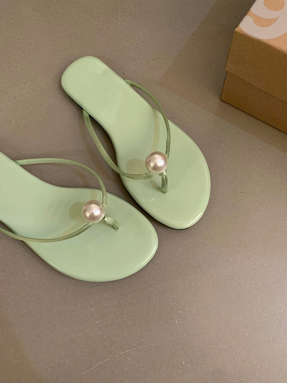 Get trendy with By the cottage faux pearl in mint flat shoes sandal slipper -  available at Peiliee Shop. Grab yours for $28 today!