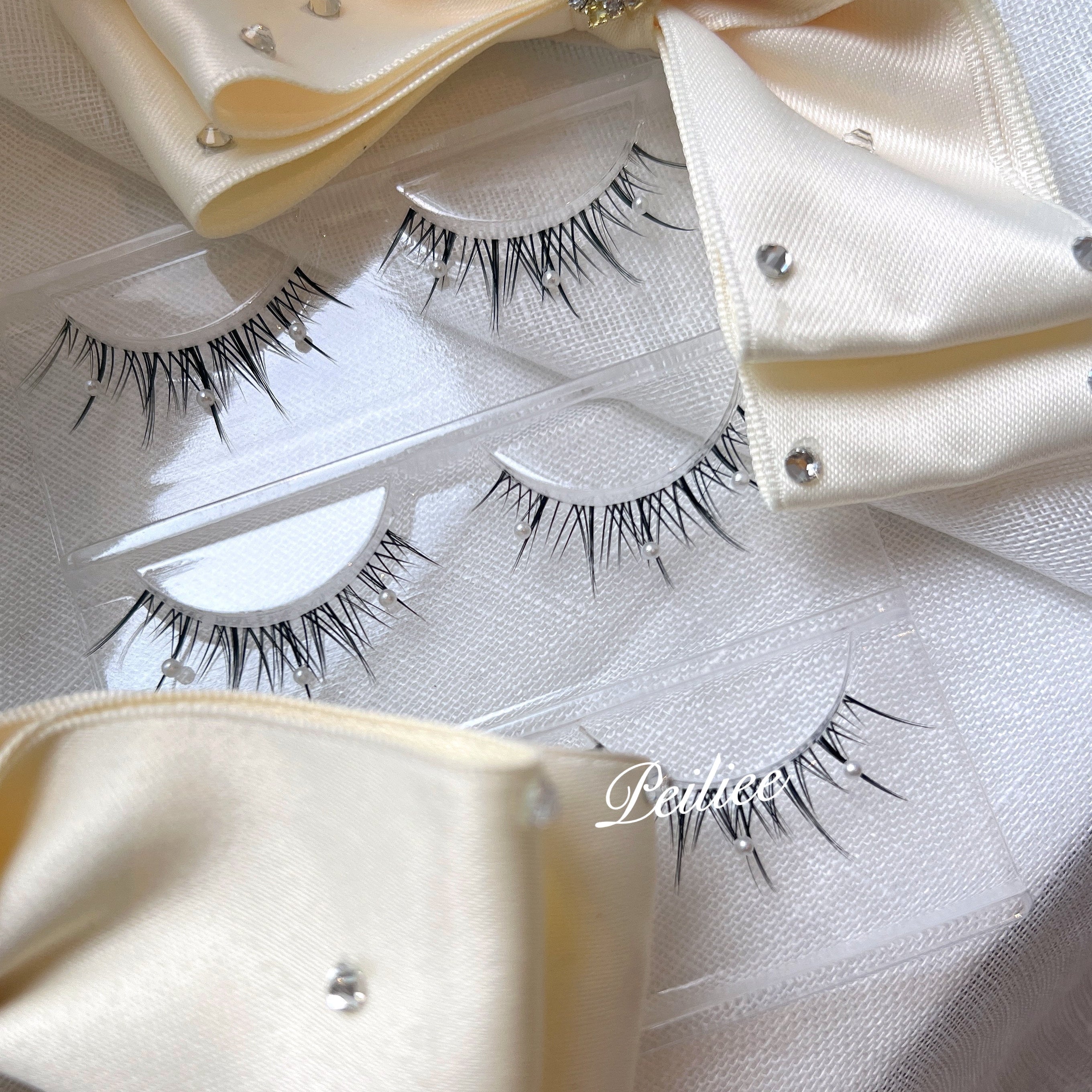 Get trendy with Mermaid Pearl Eyelashes 3 sets -  available at Peiliee Shop. Grab yours for $8.90 today!