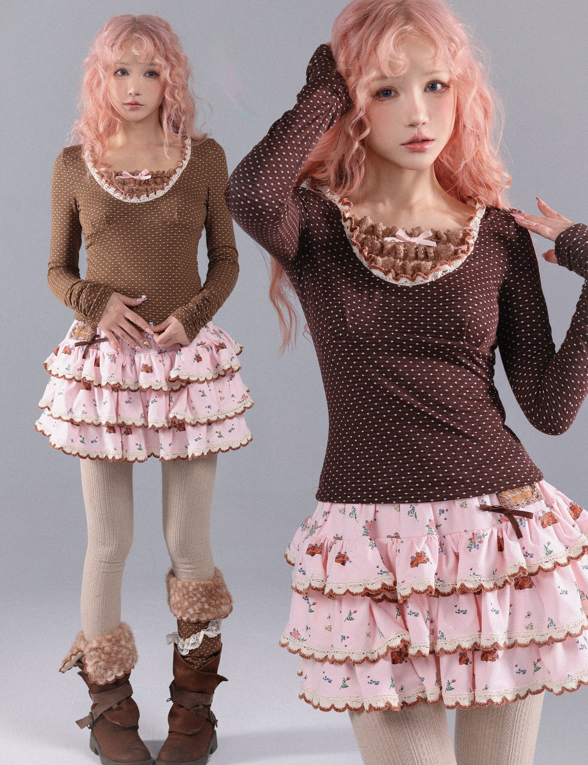 Two women wearing matching polka pot print sweatshirt with brown tops and pink ruffled skirts on a plain background.