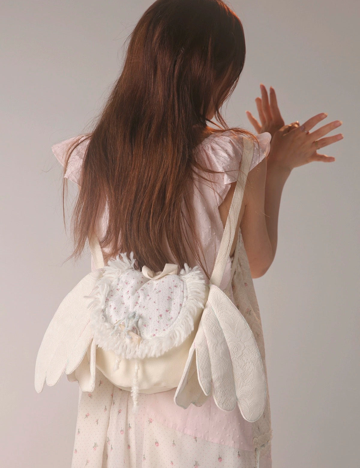 Get trendy with [Rose Island] Angel wings double-shoulder backpack -  available at Peiliee Shop. Grab yours for $43 today!