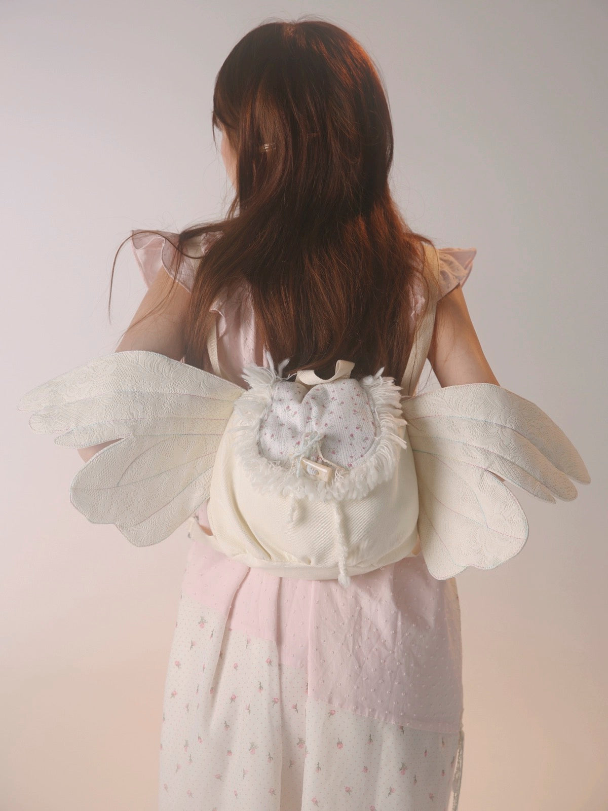 Get trendy with [Rose Island] Angel wings double-shoulder backpack -  available at Peiliee Shop. Grab yours for $43 today!