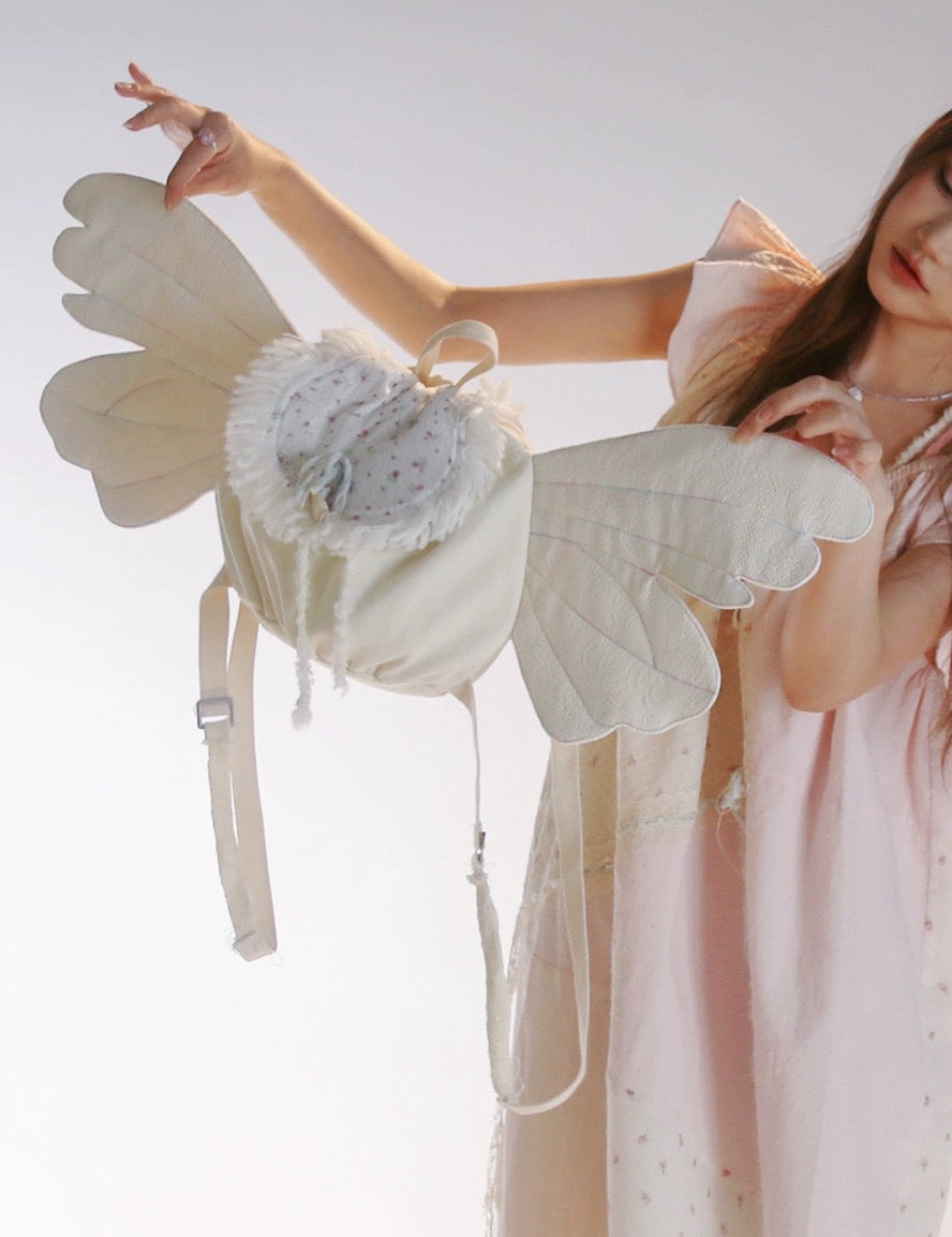 Get trendy with [Rose Island] Angel wings double-shoulder backpack -  available at Peiliee Shop. Grab yours for $43 today!